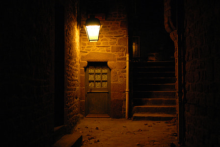 photo of door in front of  yellow street light thumbnail