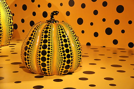 yellow and black ceramic gourd figurine thumbnail