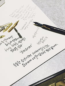 black fountain pen on white printer paper thumbnail