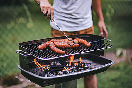 Pork and sausage on the grill thumbnail