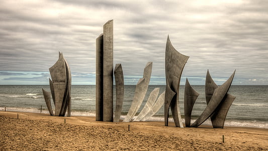 gray abstract figure on the seashore thumbnail