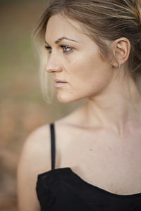 selective photo of woman in black spaghetti strap top thumbnail