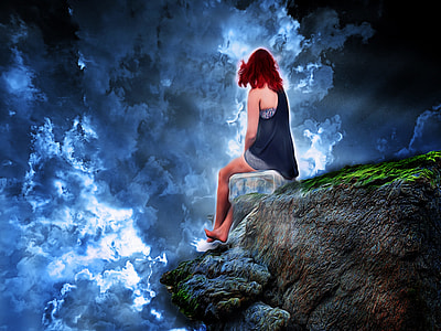 girl seating on brown mountain cliff thumbnail