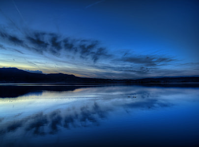 calm body of water during daytime thumbnail