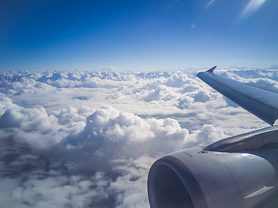 white commercial aircraft cruising in the sky during daytime thumbnail