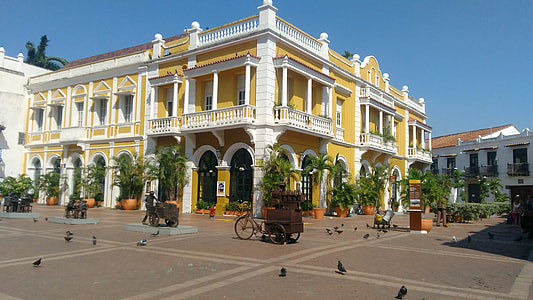 low angle photo of yellow concrete palace thumbnail