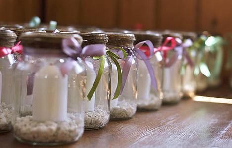 clear glass jar lot on brown wooden table thumbnail