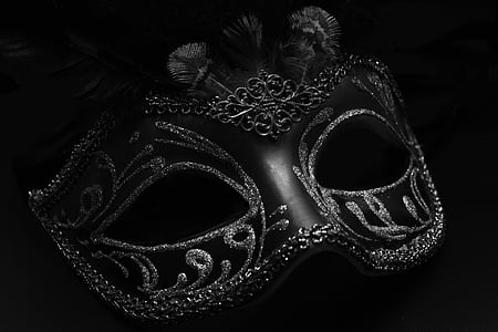 grayscale photo of silver studded masquerade thumbnail