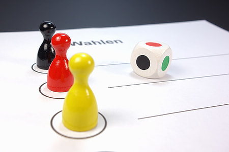 close-up photography of dice on top of paper thumbnail