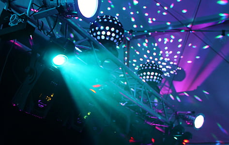 low angle photo of two turned on disco balls thumbnail