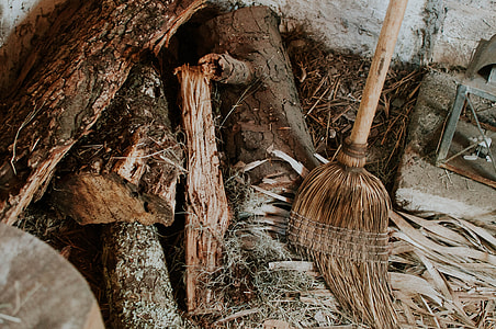 wooden broom beside firewoods thumbnail