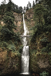 white bride near waterfalls during daytime thumbnail