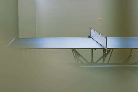 blue table tennis board with net thumbnail