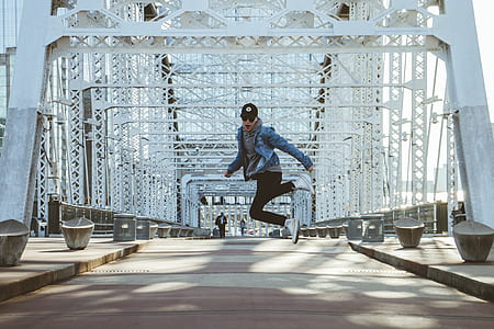 man doing jump shot in bridge thumbnail