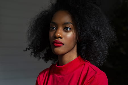 selective focus photo of woman in red top and red lips thumbnail