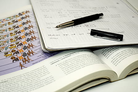black pen beside notebook thumbnail