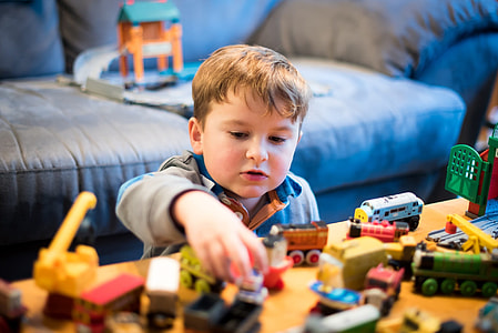 child playing with toys thumbnail