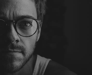 man in black framed eyeglasses taking selfie thumbnail
