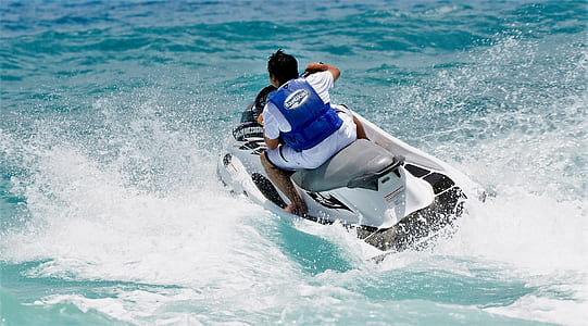 man riding on personal watercraft thumbnail