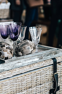 Fancy restaurant dinner table decorated with quail eggs and feathers thumbnail