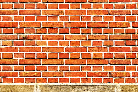 pile of brown concrete bricks wall thumbnail