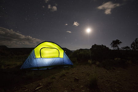 blue and green dome tent under clear night sky thumbnail