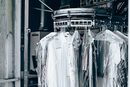 white shirts on stainless steel organizer thumbnail
