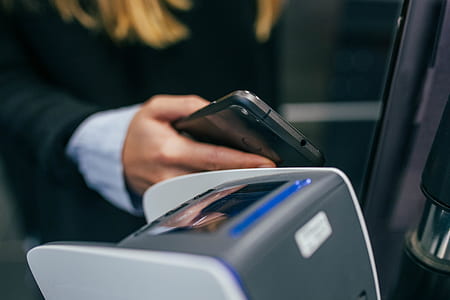 person holding smartphone thumbnail