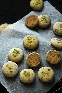 round breads on white paper thumbnail