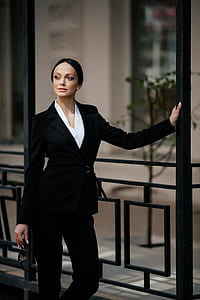 woman standing near door inside room thumbnail