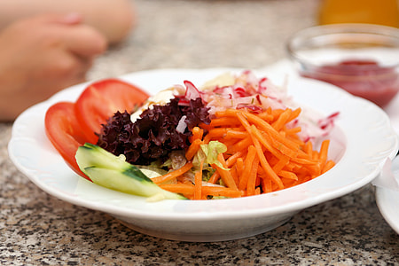 vegetable salad on white ceramic bowl thumbnail