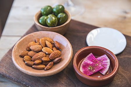 almond nuts on round brown bowl thumbnail