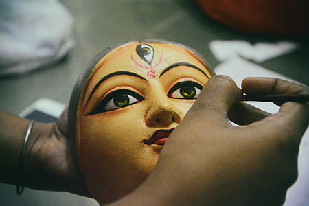 Person Doing Handcraft Face Mask thumbnail