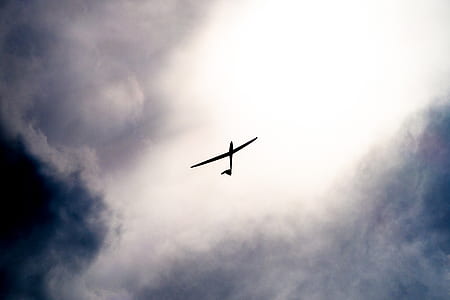 black airplane at daytime photo thumbnail