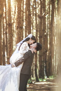selective focus photography of bride and groom thumbnail