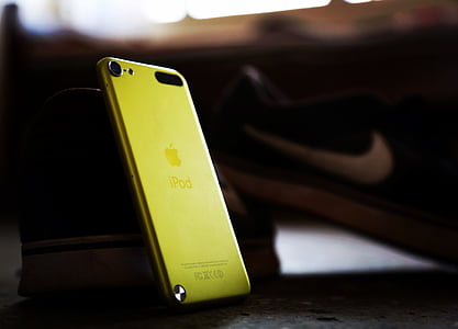 selective photography of yellow iPod Touch thumbnail