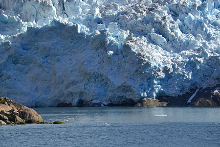 snow mountain on body of water thumbnail