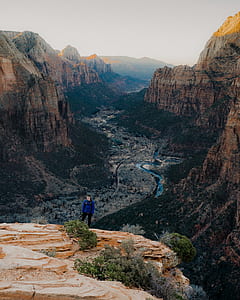 person standing on cliff thumbnail