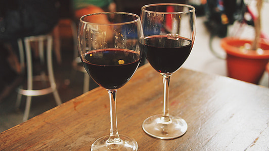 photo of two wine glasses filled with liquor thumbnail