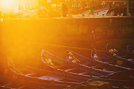 painting of brown wooden boats thumbnail