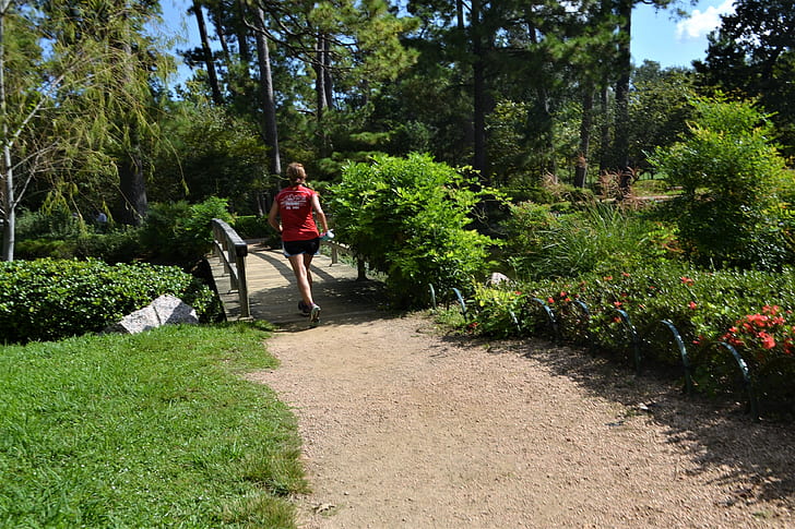 woman walking on bridge