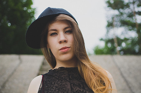 woman wearing black fitted cap thumbnail
