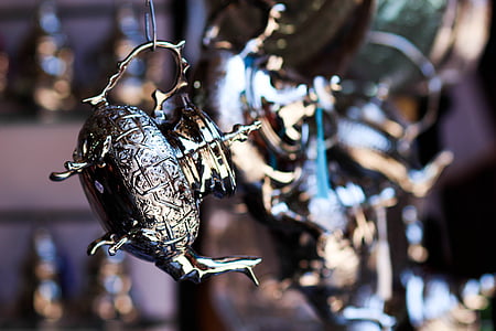 shallow focus photography of silver teapot thumbnail