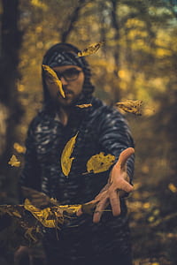 man throwing leafs thumbnail