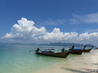 three brown sail boat thumbnail