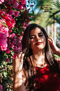 woman wearing red sleeveless top thumbnail