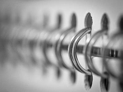 selective focus photography of ring book thumbnail