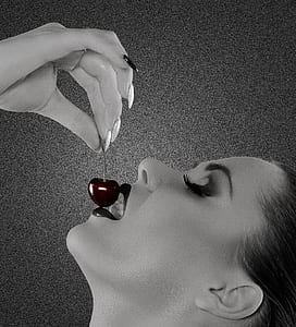 woman eating cherry fruit thumbnail