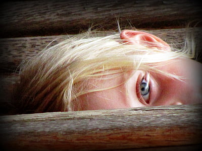 girl with blonde hair showing her eye thumbnail