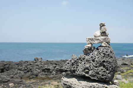 stack of small gray stones during daytime thumbnail